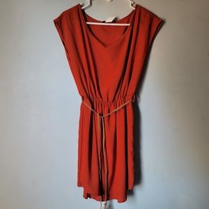 Burnt orange dress with tan braided belt